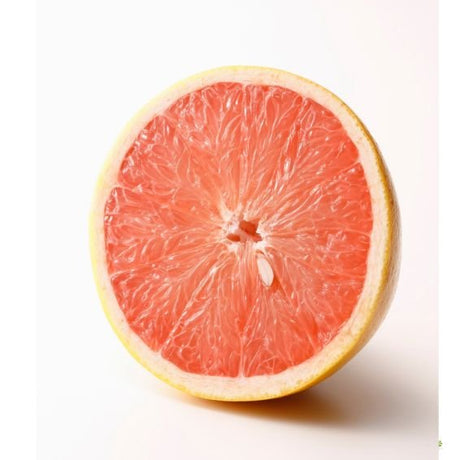 Aufgeschnittene rote Star Ruby Grapefruit mit rosarotem Fruchtfleisch